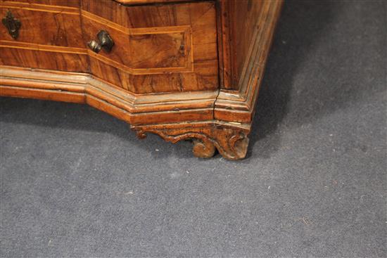 A pair of 18th century Italian walnut commodes, W.2ft 4in. D.1ft 4in. H.2ft 9in.